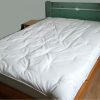 surmatelas laine pour une accueil douillet